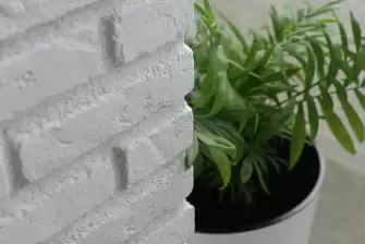 Отделка П-образного балкона искусственным камнем с утеплением