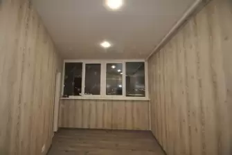 Отделка балкона под ключ с теплым остеклением ПВХ Рехау