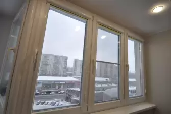 Теплое остекление балкона Сапожок окнами ПВХ Рехау